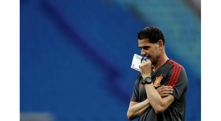 Shell-shocked Spain face Portugal in World Cup blockbuster
