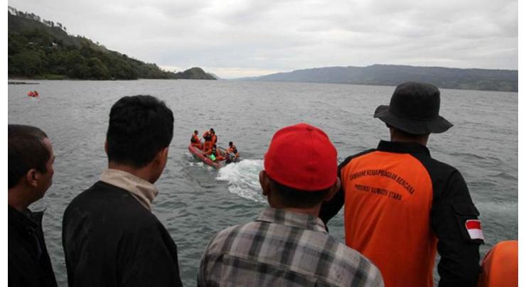 Search on for dozens missing after ferry sinks on Indonesian crater lake

