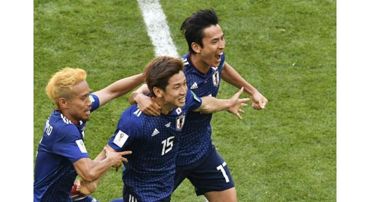 Japan make history with World Cup win against 10-man Colombia
