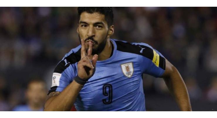 Suarez wins 100th Uruguay cap, Saudi Arabia drop goalkeeper
