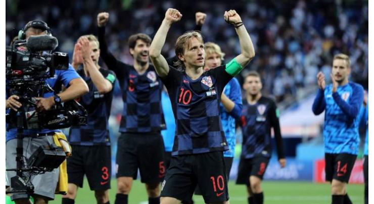 Croatia soccer team crush Argentina to reach World Cup knockout stage
