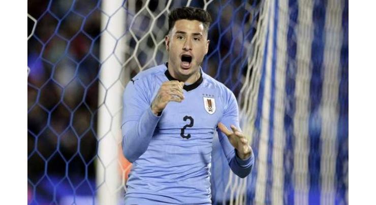 Uruguay's Gimenez ruled out of World Cup group decider
