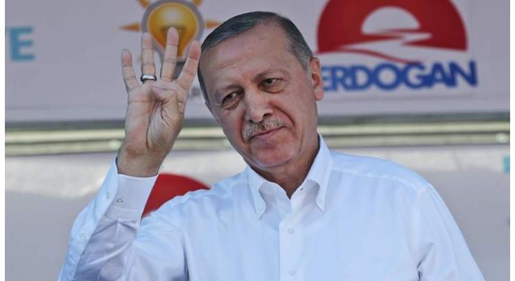 Erdogan snares revamped powers as rival concedes defeat
