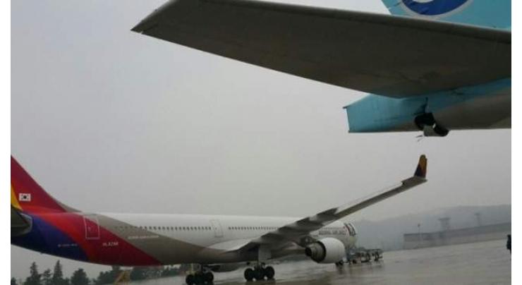 Two airplanes collide at Gimpo airport amid heavy rain
