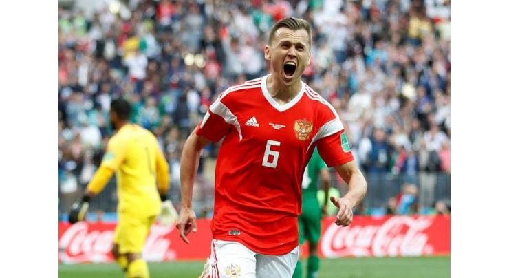Journeyman Dzyuba wins Russian hearts at World Cup
