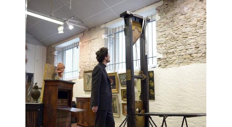 Sale of guillotine divides France
