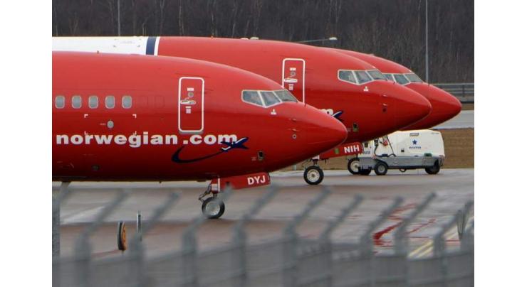 Norwegian posts surprise profit, sending shares flying
