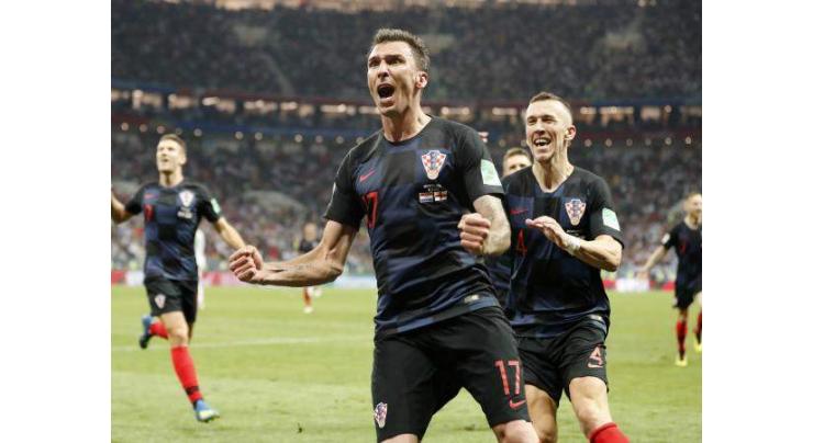 Exhausted Croatia train sights on France in World Cup final
