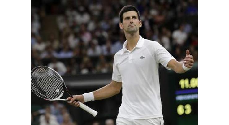 Djokovic leads Nadal as Wimbledon semi-final halted for night
