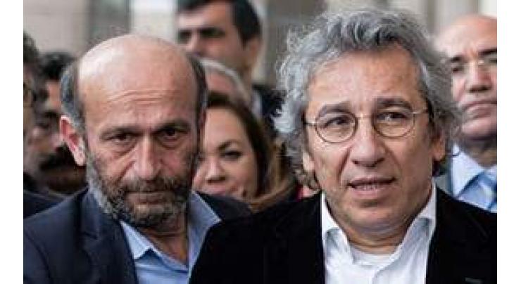 Turkey acquits top journalist in 'espionage' case
