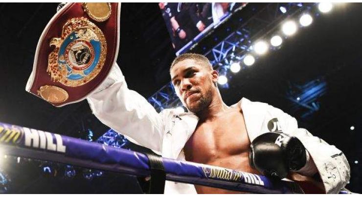 Joshua to defend heavyweight titles against Povetkin
