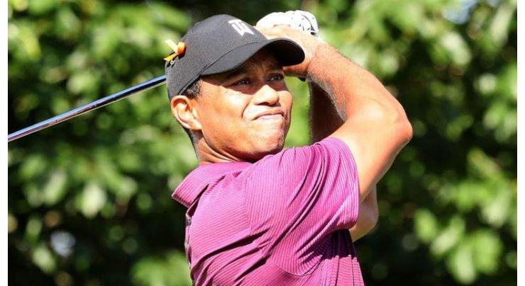 Woods made to wait for his Open return
