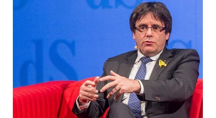 Spain drops international arrest warrants for Puigdemont, other Catalans
