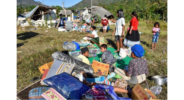 Indonesia evacuates tourists after Lombok quake kills 91
