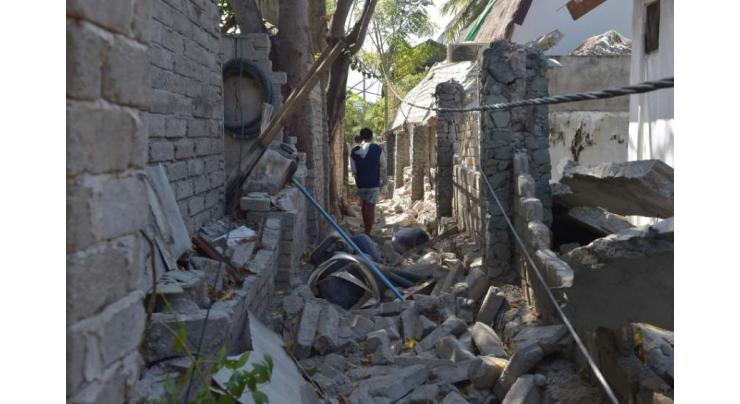 Death toll from Indonesia quake tops 380

