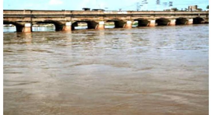 River Chenab runs in medium, low flood
