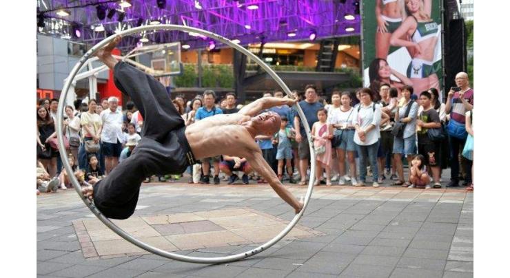 In the hoop: Taiwan's spinning street artist
