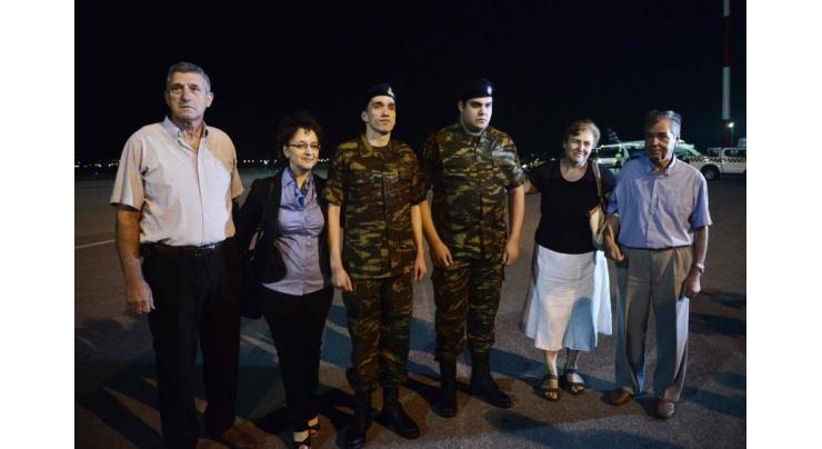 Two Greek soldiers return home after Turkey release
