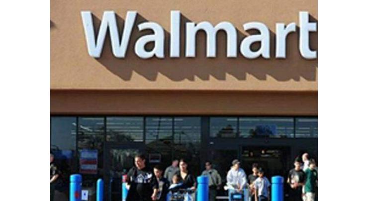 Walmart reports Q2 loss, but higher sales; shares rise

