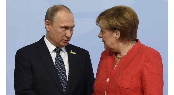 Putin, Merkel Say Iran Nuclear Deal Must Be Preserved