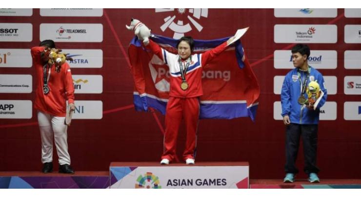 Agony and ecstasy as lifter Ri takes North Korea's first Asiad gold
