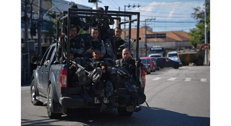 At least 13 killed in Rio security operations: officials
