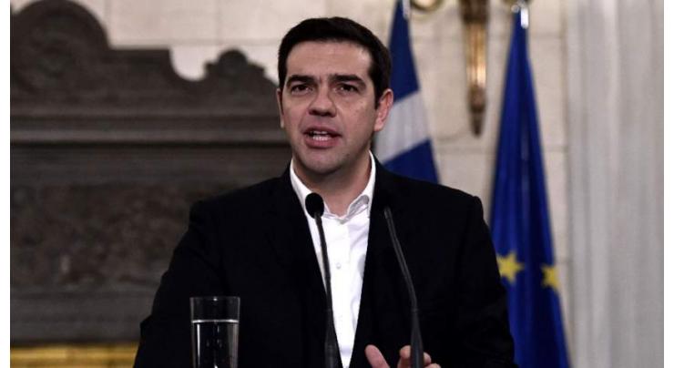 Greek Prime Minister Declares End to Country's 8-Year Debt Odyssey