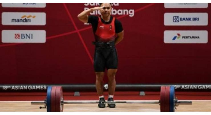 Presidential salute as Irawan lifts gold for Indonesia
