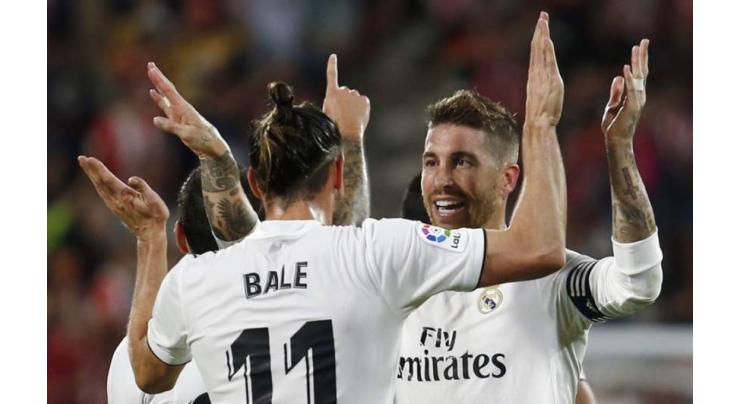 Real and Barcelona turn focus to staying perfect in La Liga

