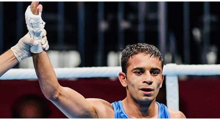 India's Amit stuns Olympic champion, Uzbeks lords of Asian ring
