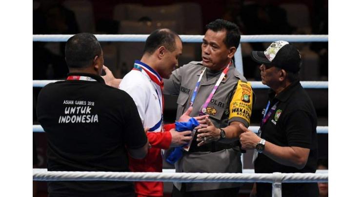 North Korea boxing coaches kicked out of Asian Games for ring protest
