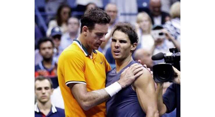 Del Potro into US Open final as Nadal quits with knee injury
