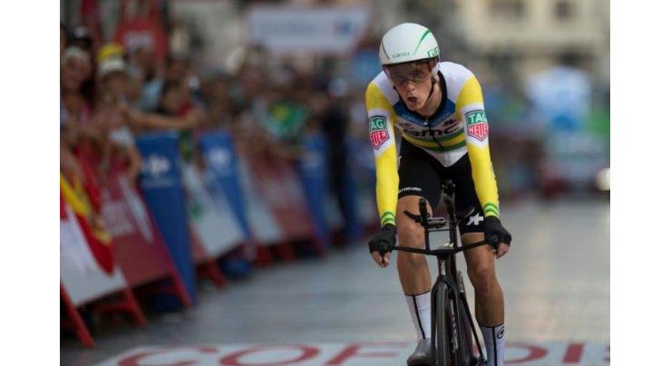 Dennis wins time trial as Yates extends Tour of Spain lead
