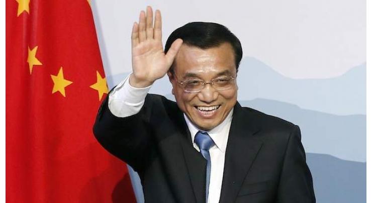 China, Japan should consolidate momentum of improvement in ties: Premier Li
