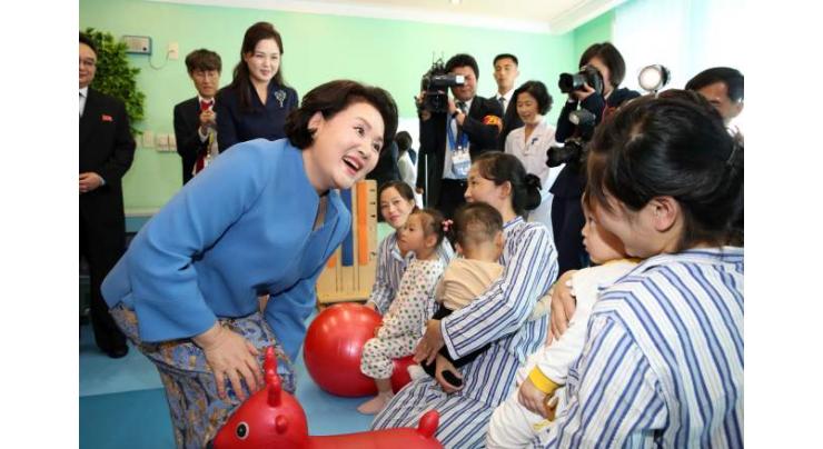 First ladies of Koreas visit children's hospital, music college in Pyongyang
