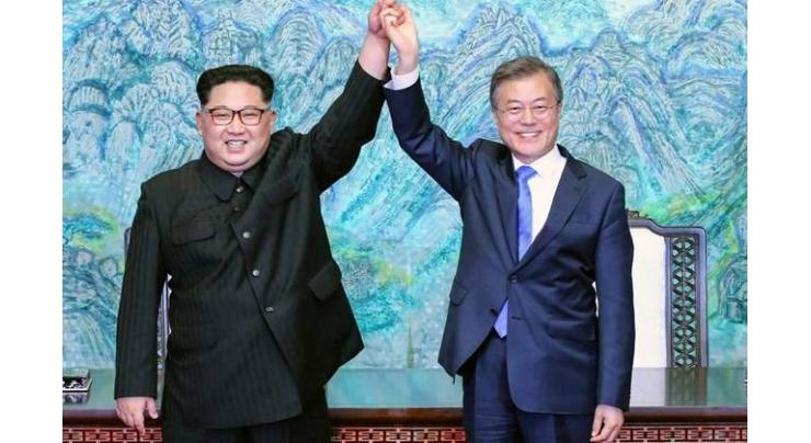 N. Korea's Kim to visit Seoul, shut missile site
