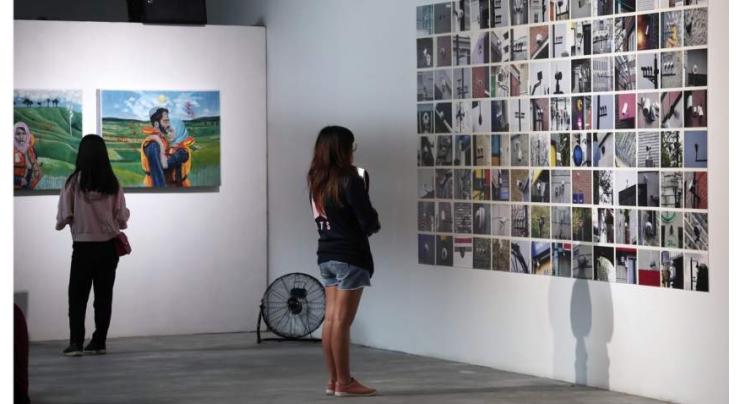 Chinese, Japanese artists hold joint photo exhibition

