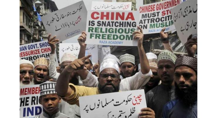 Own up to mass Muslim detentions, Amnesty tells China
