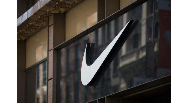 Nike reports higher profits but growth slows in China
