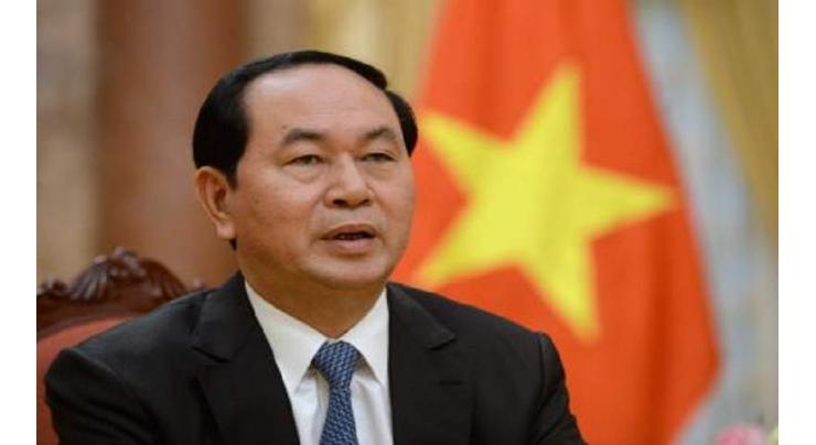 Hundreds pay tribute to Vietnam president at state funeral

