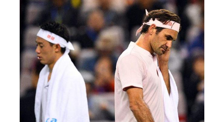 Federer fires to join Djokovic in Shanghai semis
