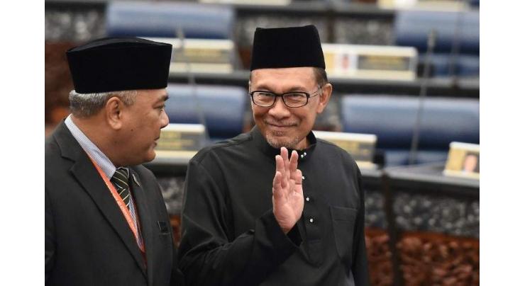 Malaysian leader in waiting Anwar in triumphant return to parliament
