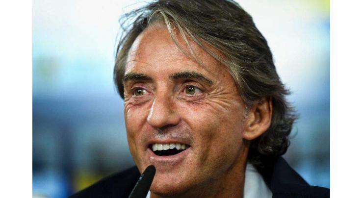 Mancini off the mark as Italy awaken after winless year
