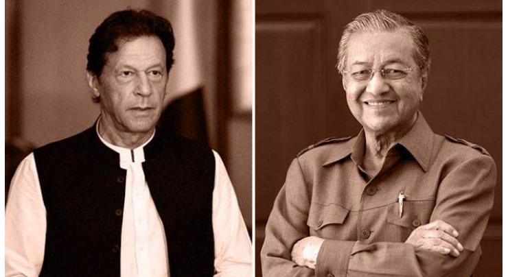 Imran Khan for stronger bilateral ties with Malaysia; telephones Mahathir Mohamad

