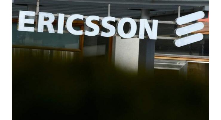 Ericsson turns first profit in two years, shares climb
