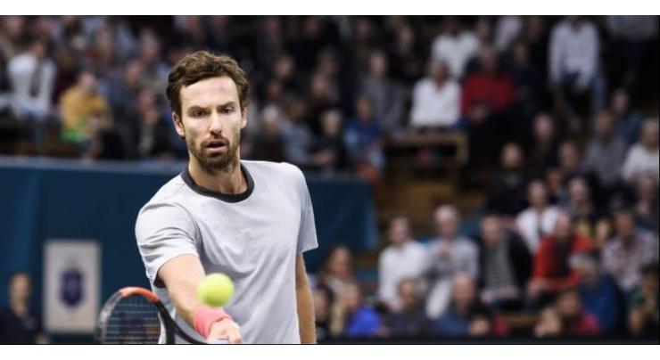Gulbis stuns Isner to reach first final in four years
