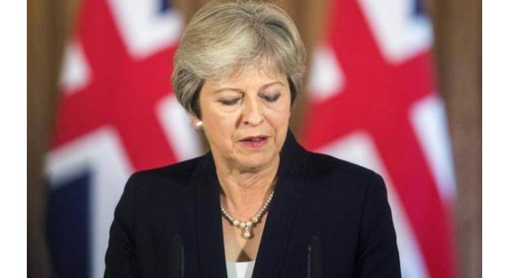 UK PM holds course against mutinous party over Brexit
