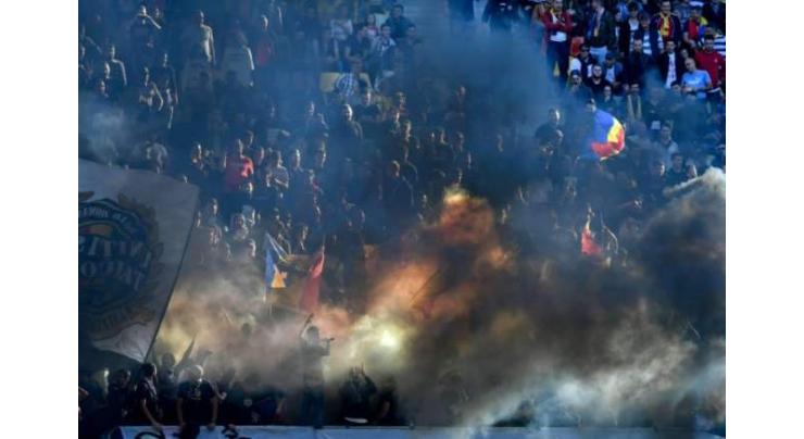 UEFA hand Romania stadium ban for fan racism
