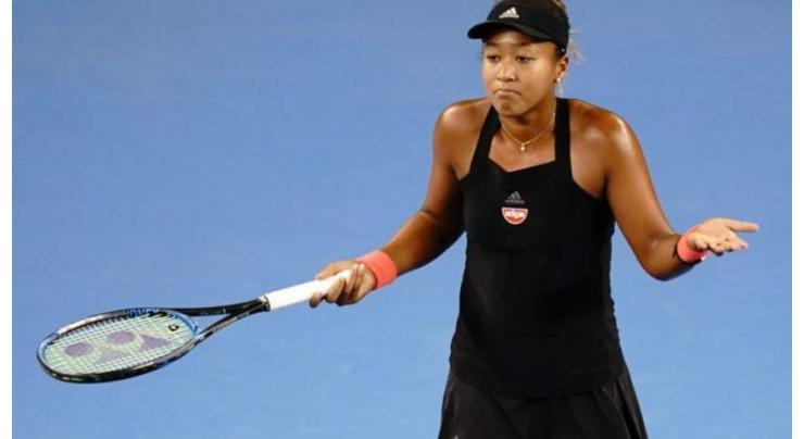Osaka to focus on form after tearful end to WTA
