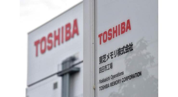 Toshiba downgrades outlook as reports warn it will slash jobs

